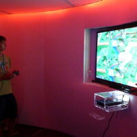 Wii U console mounted on a wall